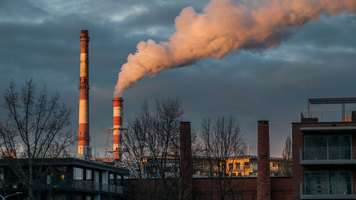 Industrial chimneys emitting smoke